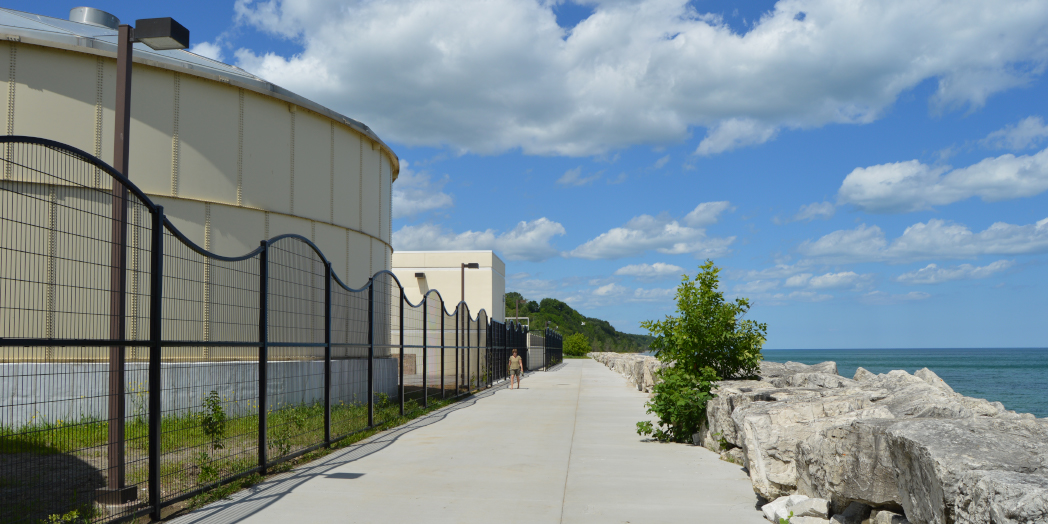 Expanded 15' wide pathway with wave theme fencing