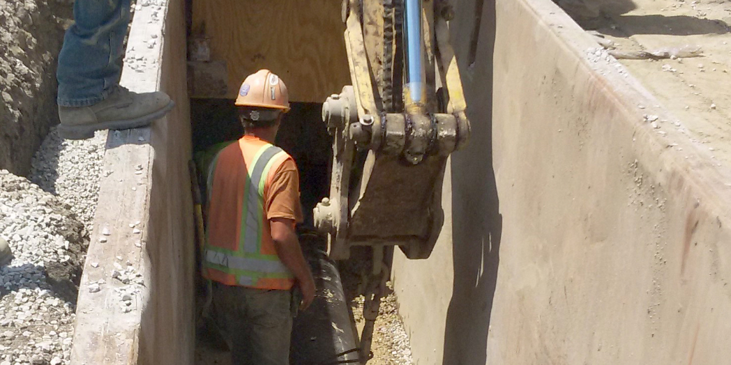 Main in trench for water main improvements