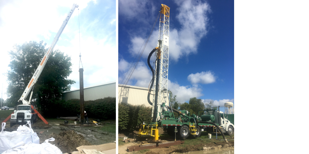 Crane installs water main piping