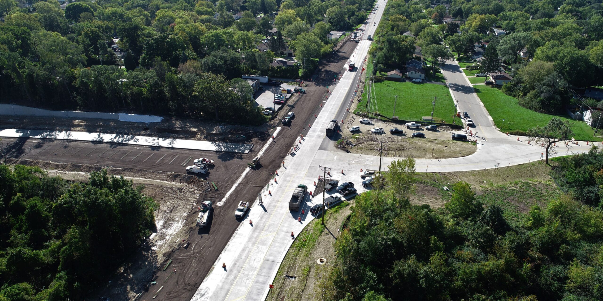 Aerial photo of Longmeadow Parkway under construction. Half of the road is closed for construction.